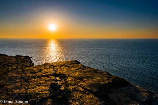Simon Bourne, photography, photographer, Tintagel, Cornwall, portfolio, image, spring, early evening, dusk, sunset, Glebe Cliff, sea, orange sky, cliffs