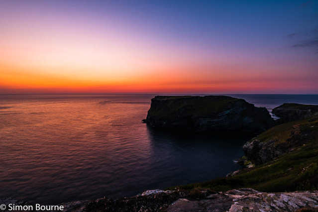 Simon Bourne, photography, photographer, Tintagel, Cornwall, portfolio, image, summer, evening, dusk, sunset, Glebe Cliff, sea, red skies, orange sky, cliffs, Tintagel Island